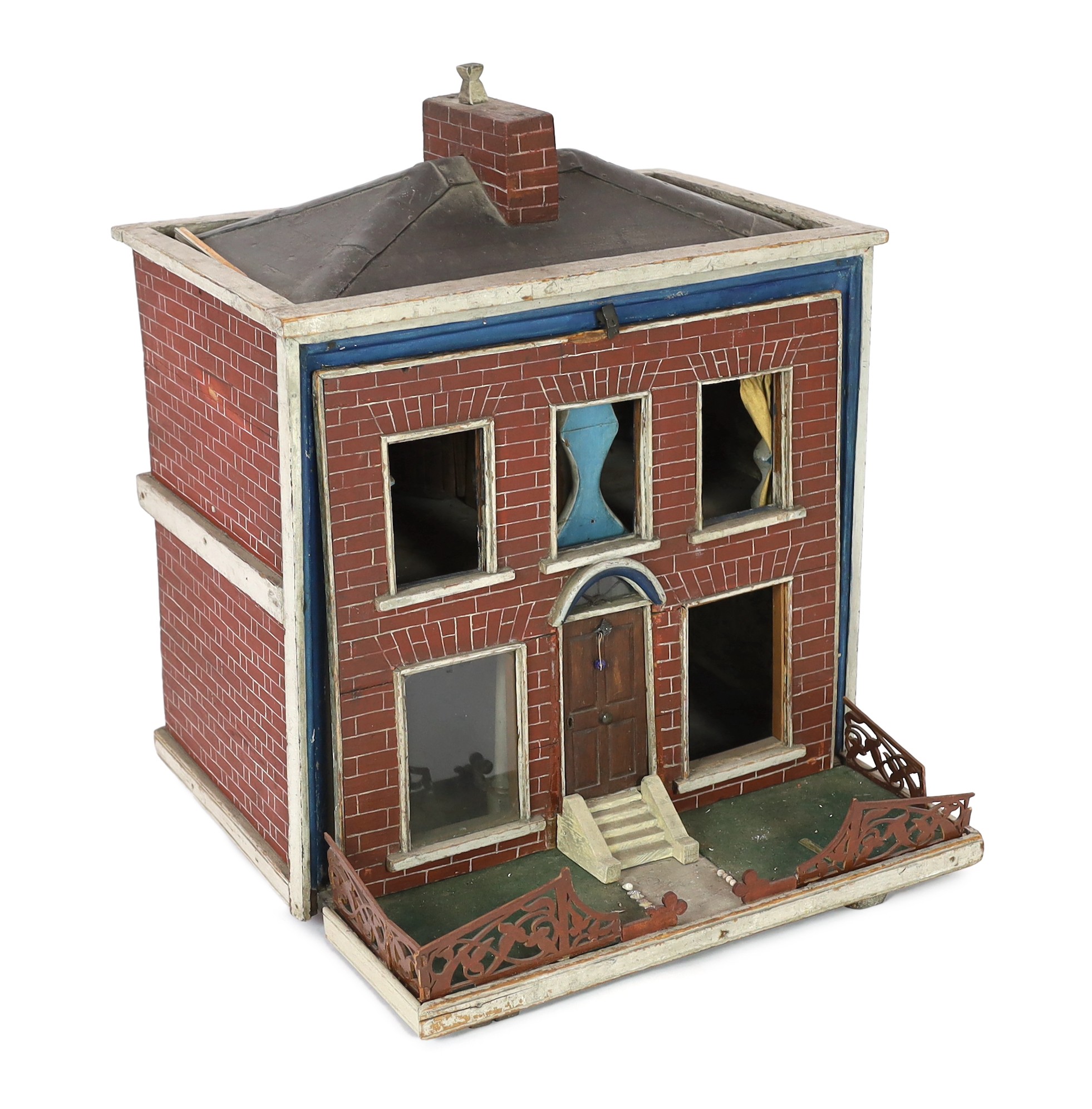 An extraordinary English dolls’ house, mid 19th century, 62cm high